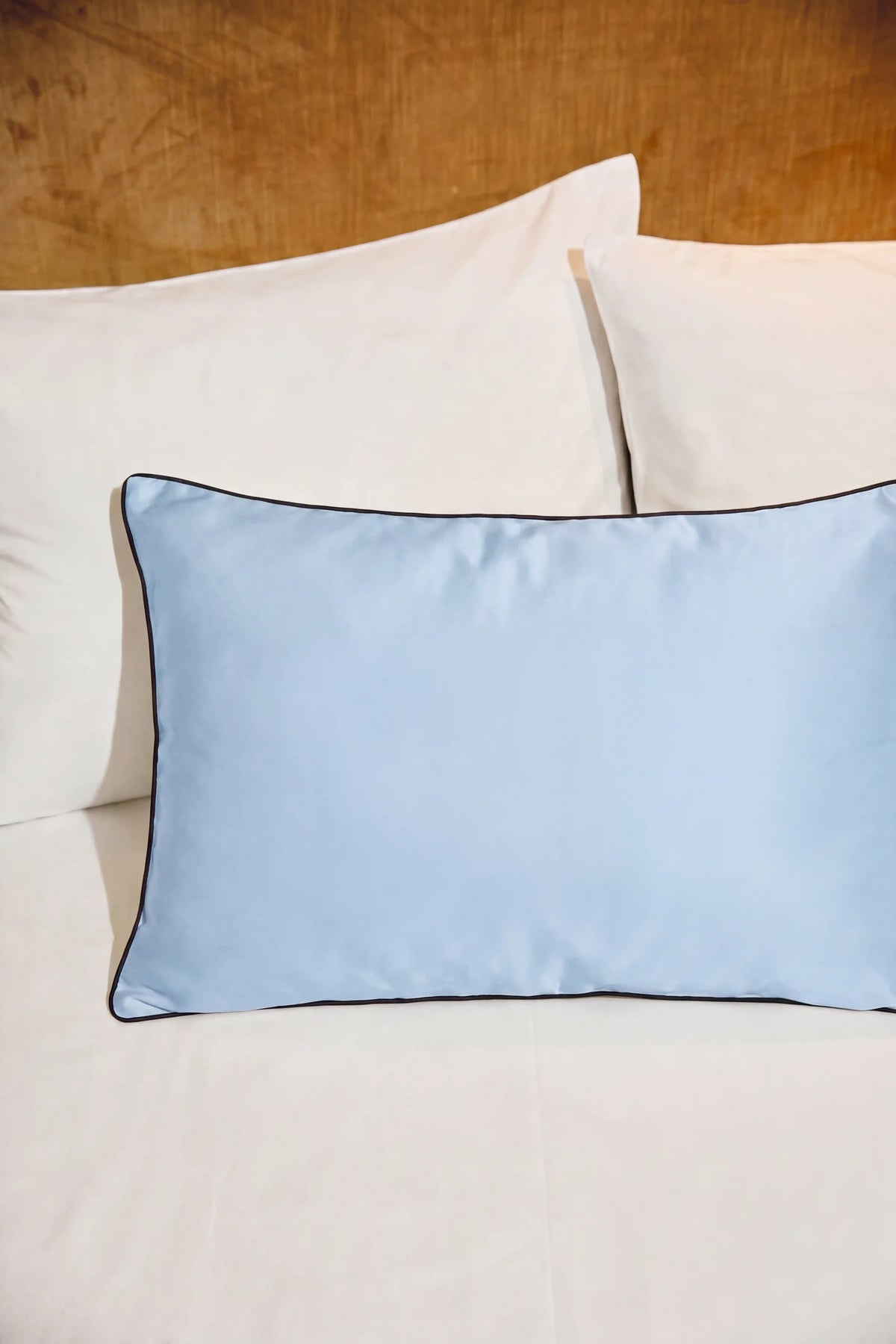 Camille Original Satin Pillowcase in Baby Blue showcasing its classic design and delicate satin sheen