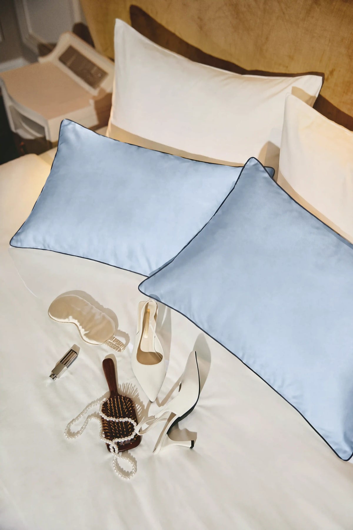 Camille Original Satin Pillowcase in Baby Blue by Meezily, an elegant blue satin pillowcase with a smooth finish