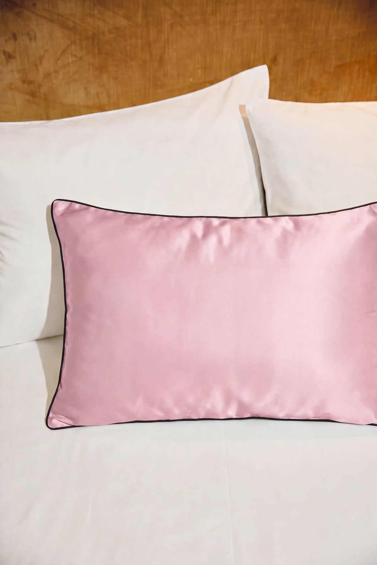 Camille Original Satin Pillowcase in Blush Pink showcasing its classic design and delicate satin sheen