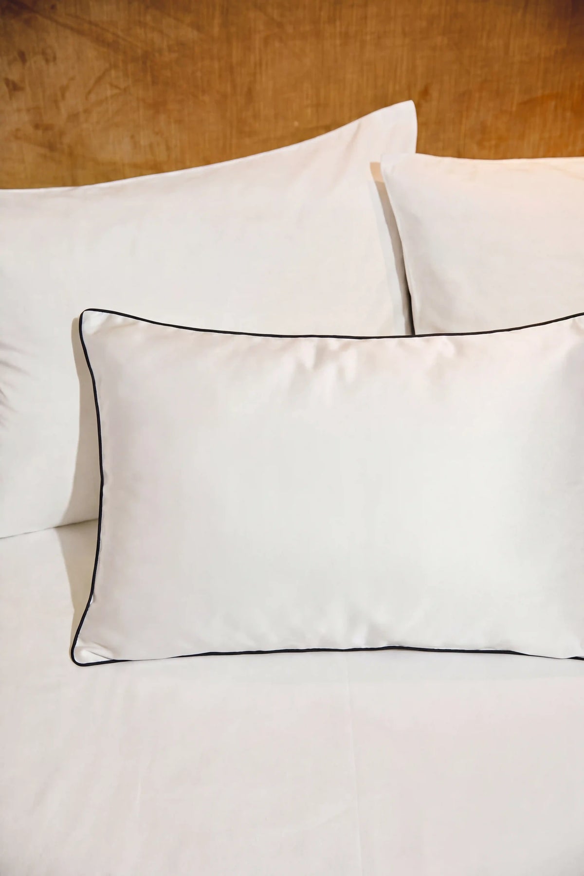 Camille Original Satin Pillowcase in White showcasing its classic design and delicate satin sheen