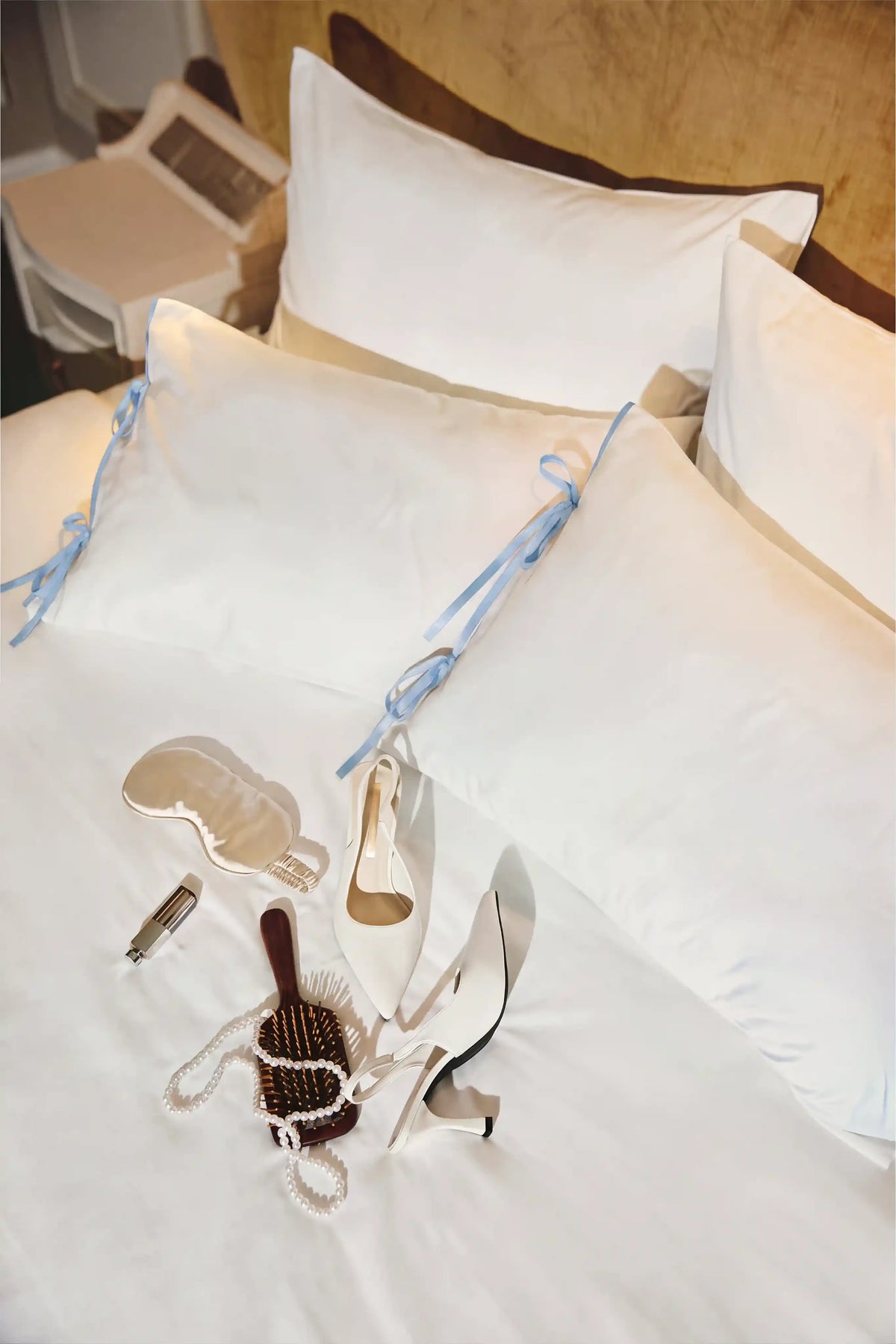 Camille Ribbons Satin Pillowcase in Baby Blue by Meezily – front view of the elegant blue satin pillowcase