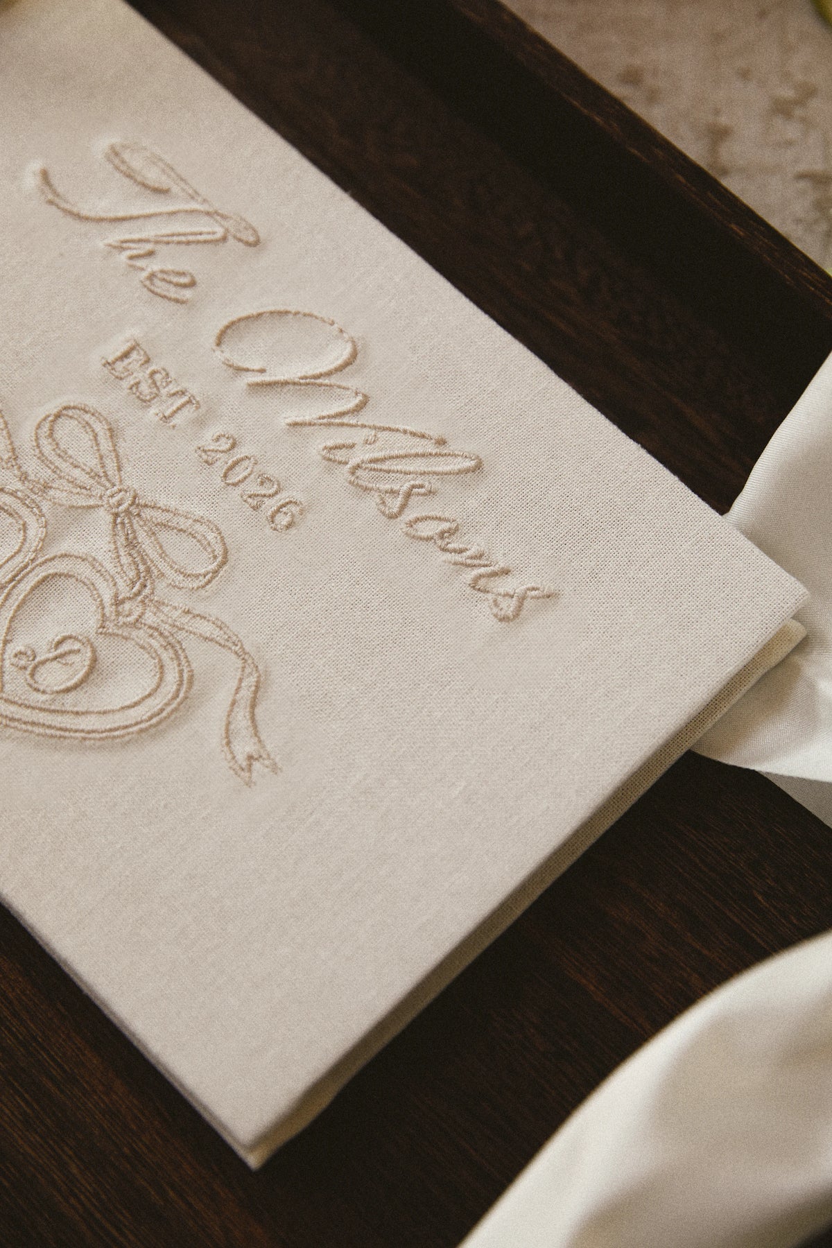 Cherish Embroidered Wedding Guest Book in Ivory featuring delicate embroidery on the fabric cover