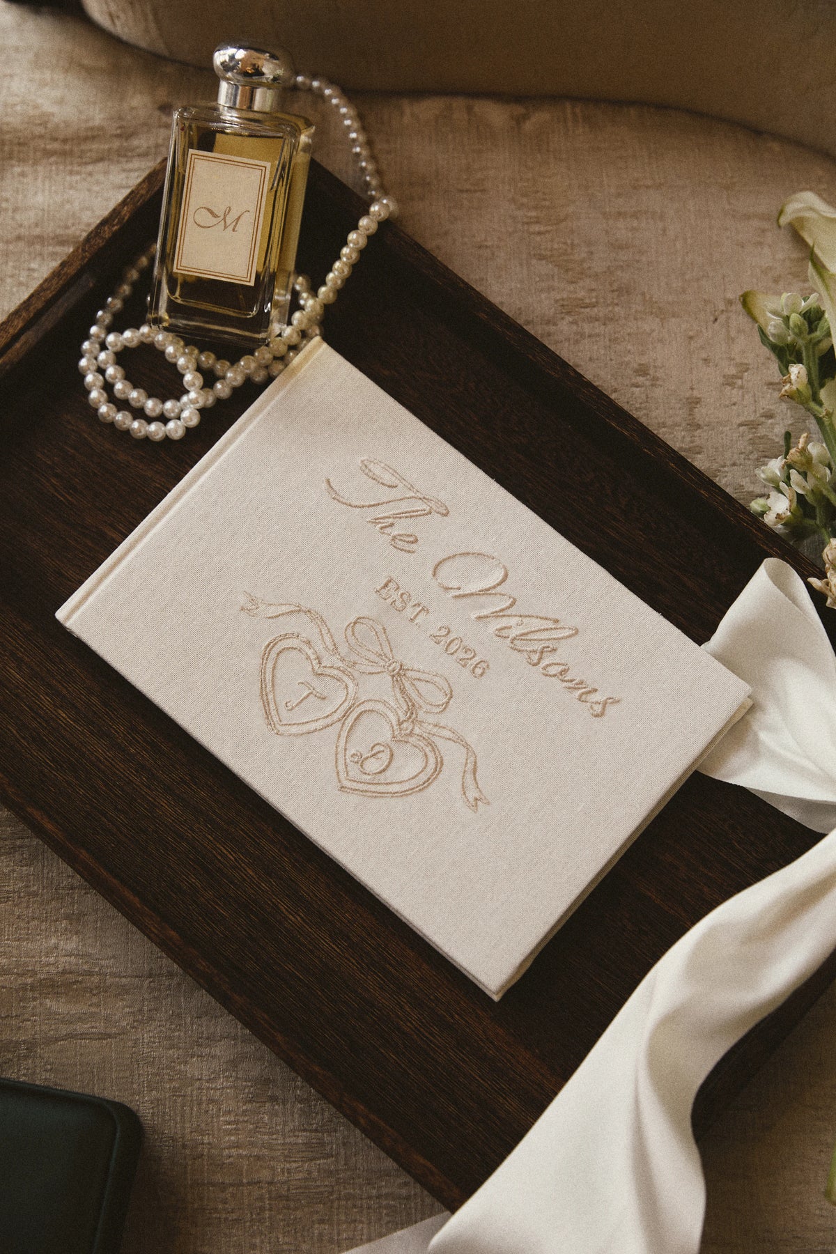 Cherish Embroidered Wedding Guest Book in Ivory by Meezily – front cover showcasing its elegant embroidered design
