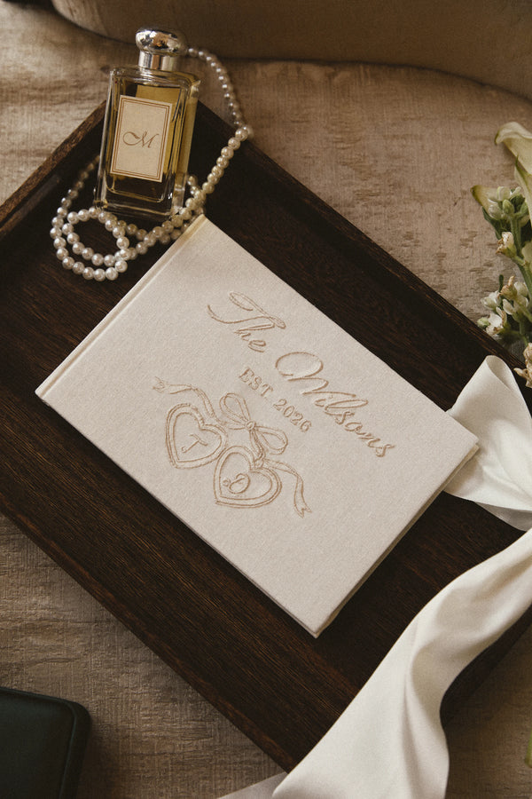 Cherish Embroidered Wedding Guest Book in Ivory by Meezily – front cover showcasing its elegant embroidered design