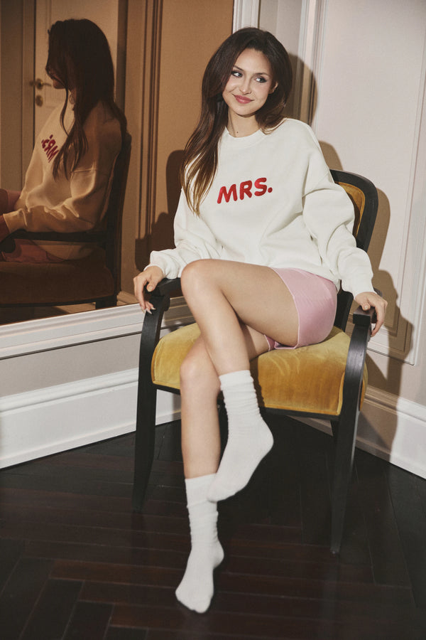 Embroidered Bridal Sweatshirt in White by Meezily, a classic white bridal sweatshirt with elegant embroidery
