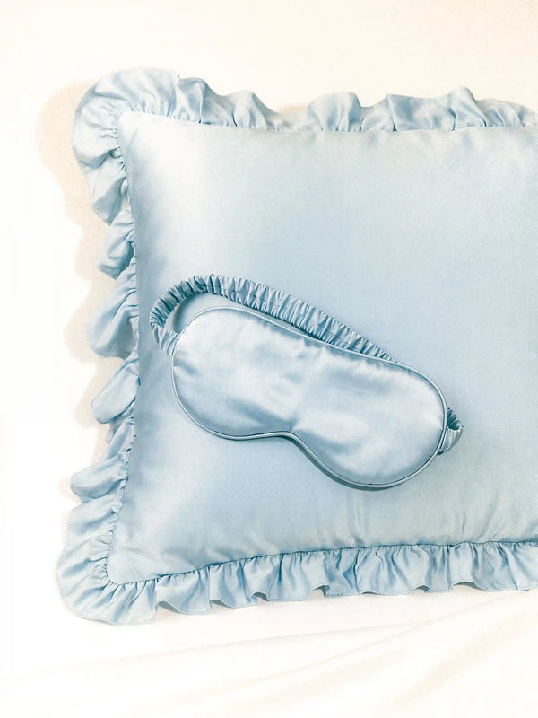 Luxe Satin Sleep Mask in Baby Blue by Meezily, an elegant blue satin eye mask with a smooth finish