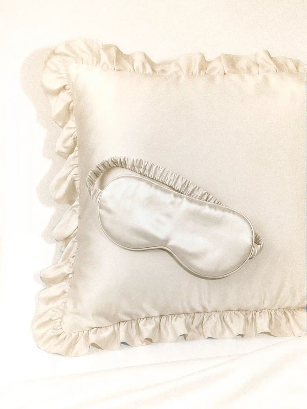 Luxe Satin Sleep Mask in Ivory by Meezily, an elegant ivory satin eye mask designed for a comfortable sleep routine