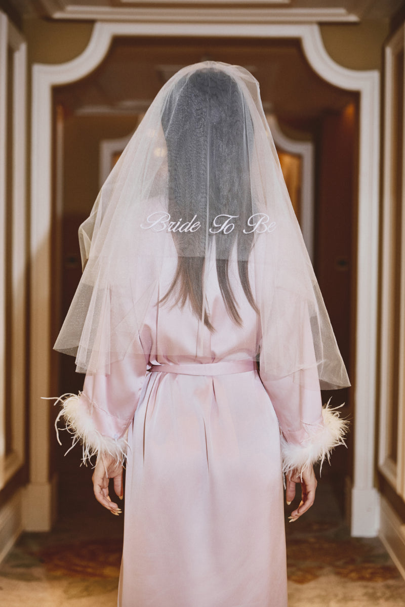 Odette Feather Satin Robe in Blush Pink featuring luxurious feather trim on the sleeves