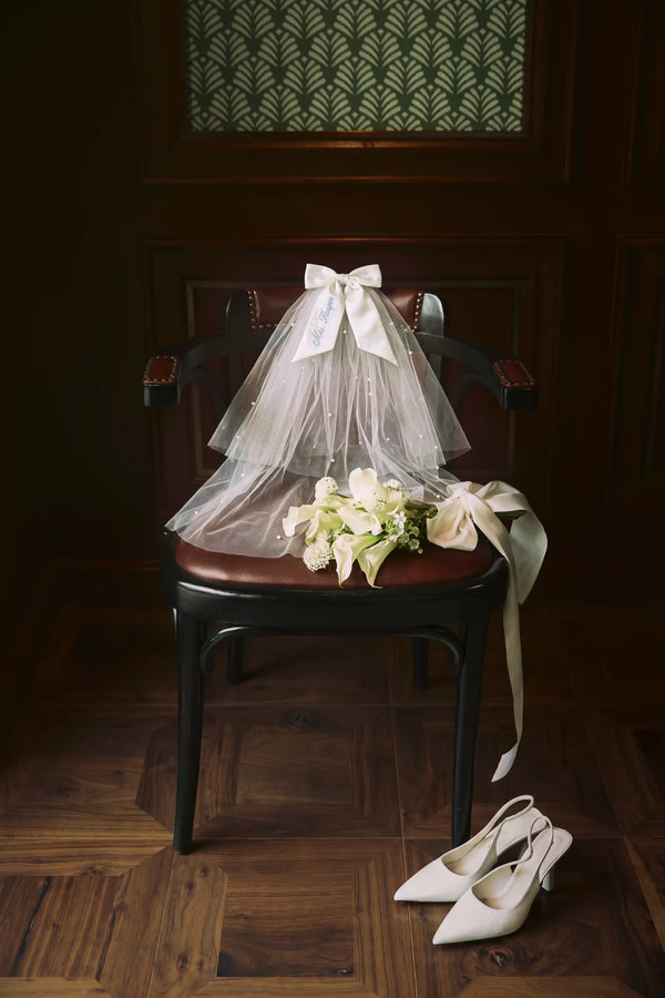 Opale Pearl Bow Veil by Meezily – front view showcasing the elegant bridal veil and pearl bow design