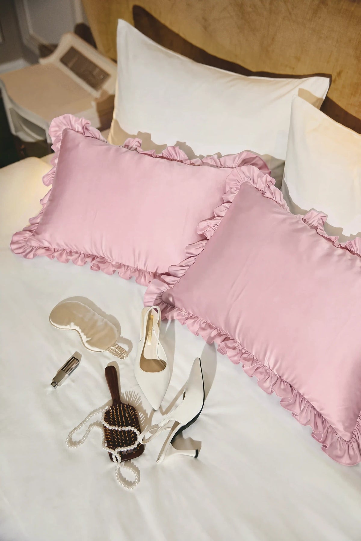 Ruffle Trim Satin Pillowcase in Blush Pink by Meezily, an elegant pink satin pillowcase with a delicate ruffled edge