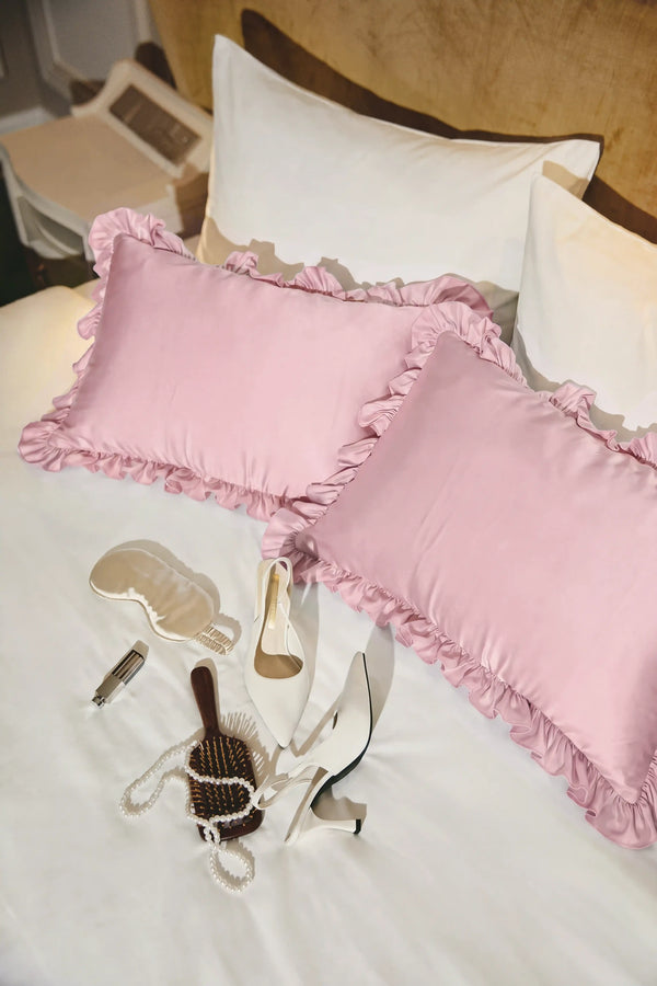 Ruffle Trim Satin Pillowcase in Blush Pink by Meezily, an elegant pink satin pillowcase with a delicate ruffled edge