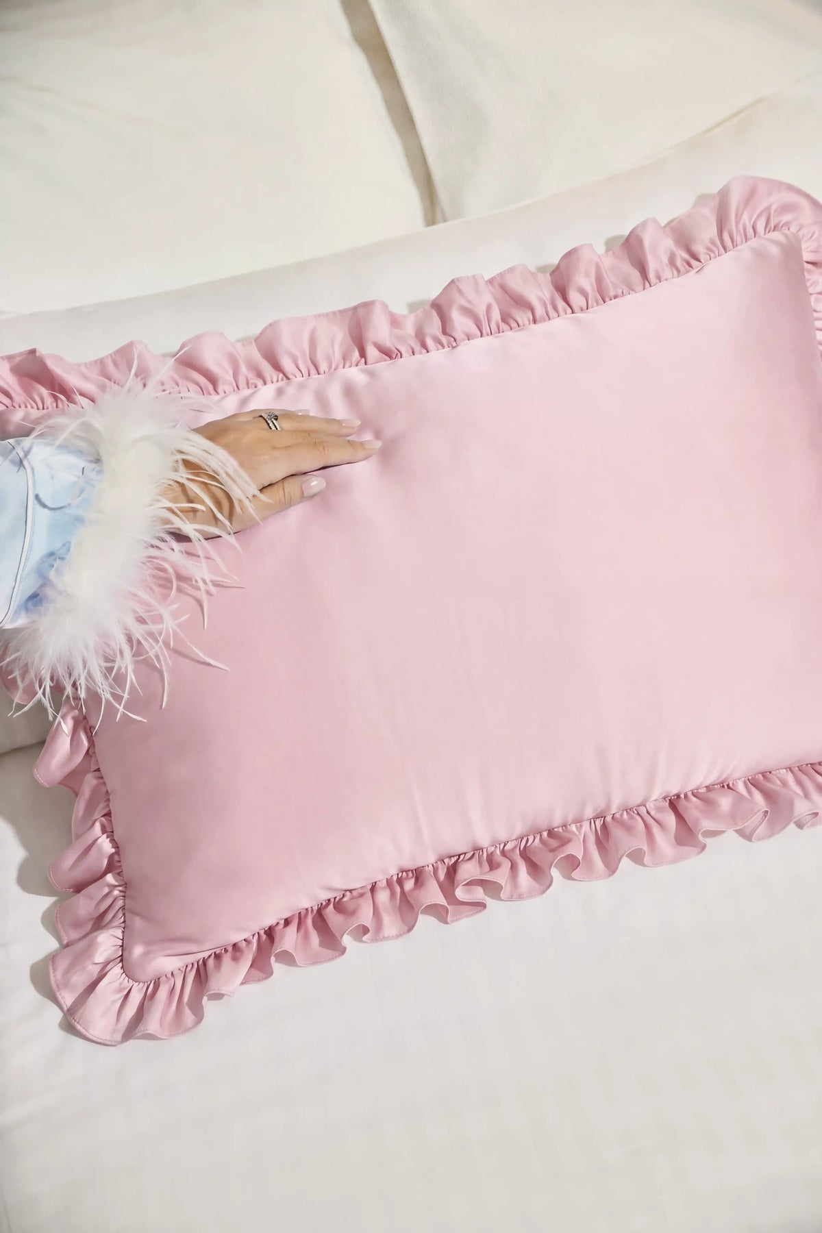 Ruffle Trim Satin Pillowcase in Blush Pink showcasing its silky satin texture and soft pink sheen