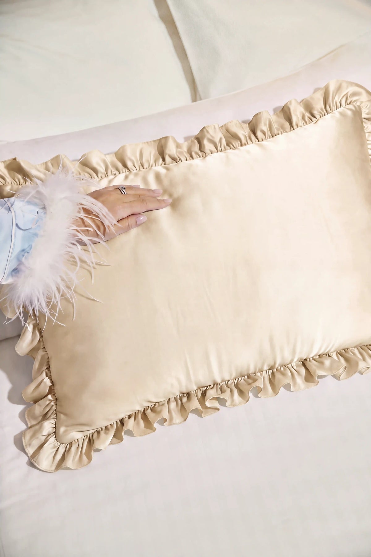 Ruffle Trim Satin Pillowcase in Champagne showcasing its silky satin texture and warm champagne sheen