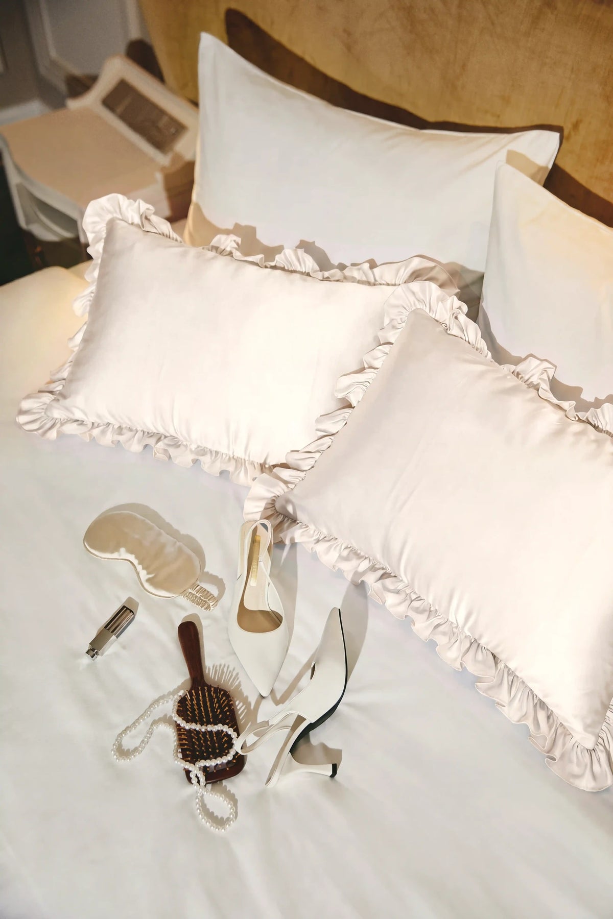 Ruffle Trim Satin Pillowcase in Ivory by Meezily, an elegant ivory satin pillowcase with a delicate ruffled edge